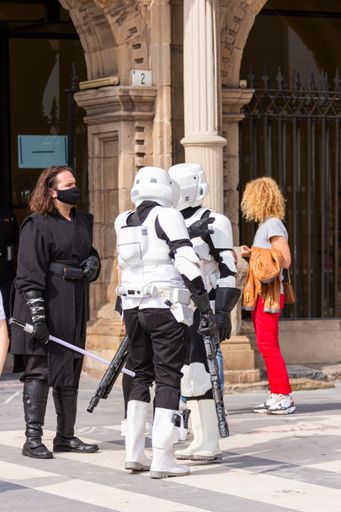 The actors representing Star Wars characters with their flashy uniforms