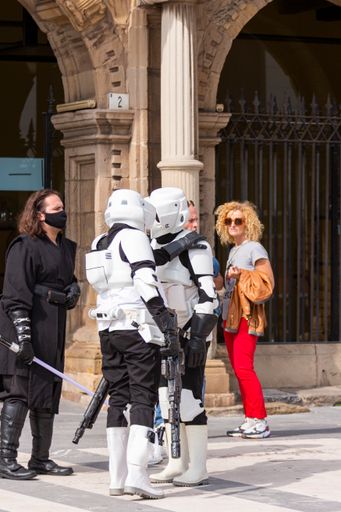 The actors representing Star Wars characters with their flashy uniforms