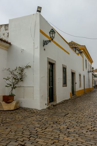 The old buildings of Faro center during a rainy day in Portugal