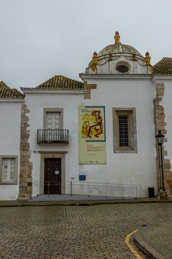 The old church of Faro center during a rainy day in Portugal