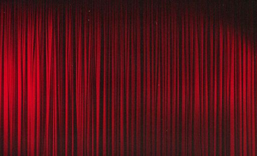 A red stage curtain background
