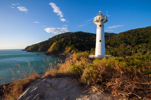 A beautiful view of Koh Lanta Thailand beach and lighthouse on a sunny day