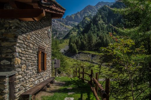 A beautiful view of a small village with cute wooden houses under the blue sky