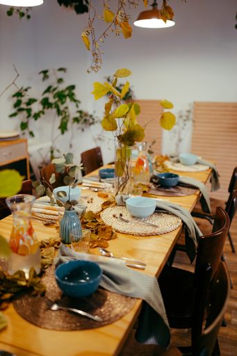 A beautiful shot of autumn-themed table setting for a birthday celebration at a restaurant