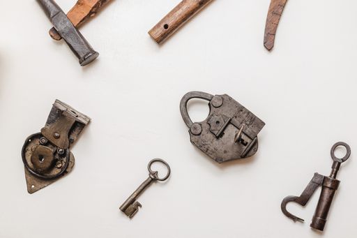 A closeup shot of different types of locks and keys from WW II era