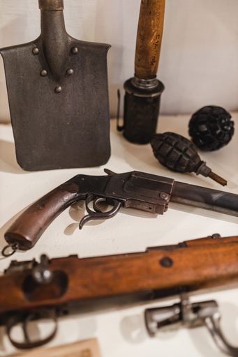 A vertical shot of weapons and tools during WWII era