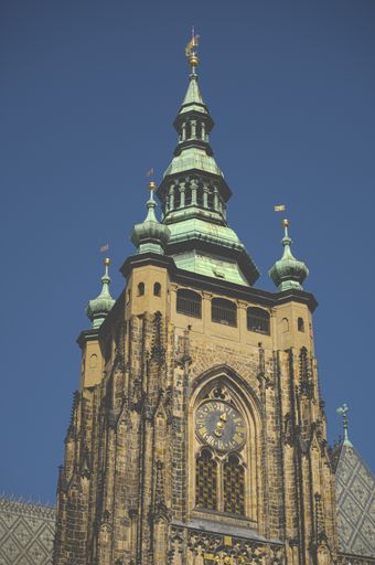 A vertical low angle shot of St. Vitus Cathedral in Prague, Czech Republic