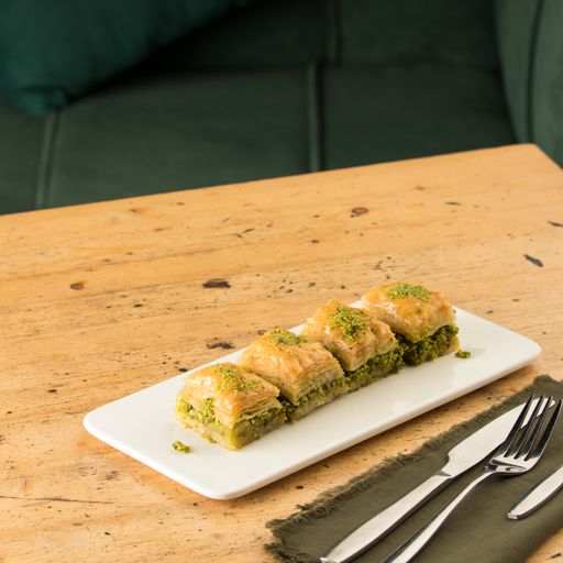 A gourmet dish of Baklava on a wooden table