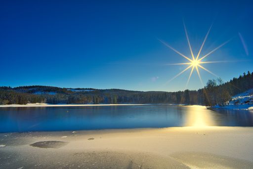 A beautiful shot of a mountainous landscape on a sunny winter day