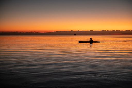 A beautiful shot of a seascape under the bright sunset in Miami