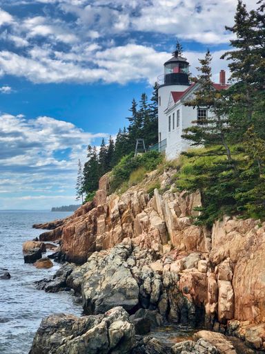 A portrait of the other side of the lighthouse in Portland Head Light in Cape Elizabeth, Maine