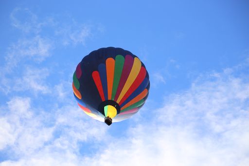 A colorful hot air balloon in a clear blue sky