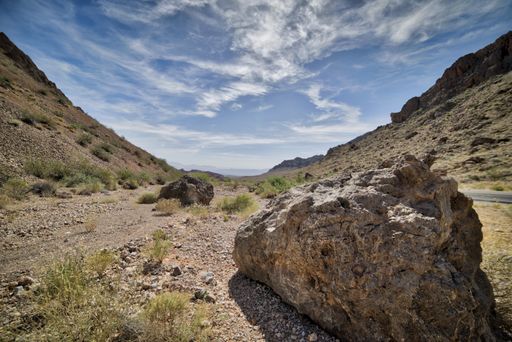 A beautiful shot of a rocky pathway with rocky hills on both sides