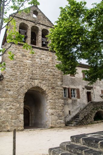 A vertical shot of an old building with beautiful arches