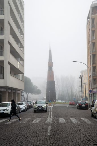 A closeup of terni street of Cesare Battisti and the chamber of commerce with fog