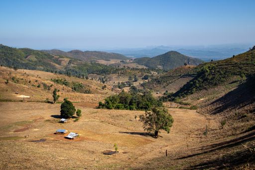 Dry farmland and hills seen on a mountain hike outside of Hsipaw town in Myanmar (Burma).
