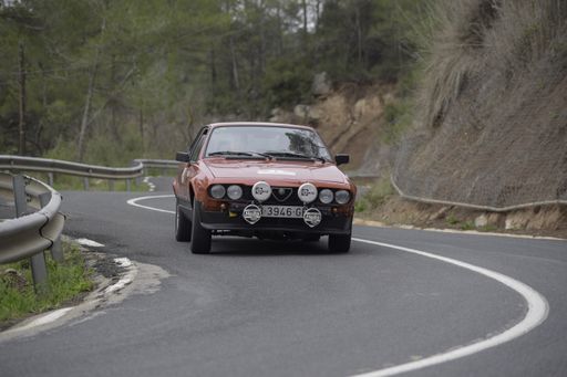 Red Alfa Romeo GTV in rally