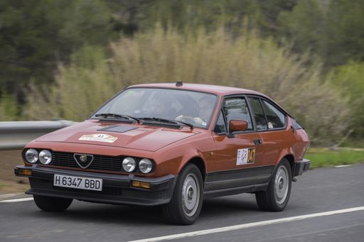 Red Alfa Romeo GTV in rally