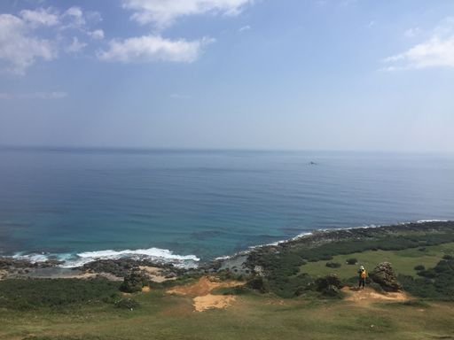 A beautiful view of the sea and the seacoast under a cloudy sky