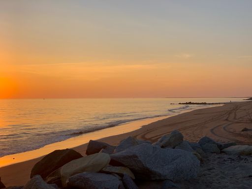The beautiful peach sunset view from the Puerto Vallarta beach
