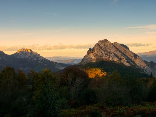 A beautiful view of rocky mountains during the sunset