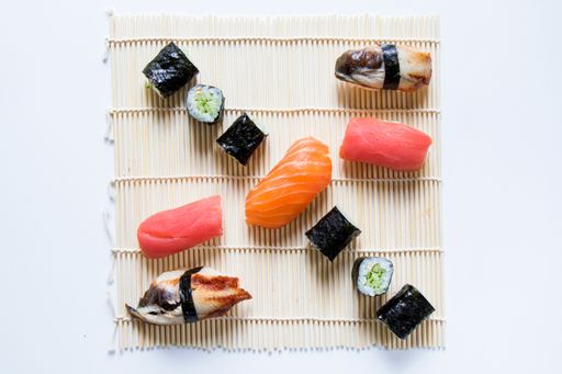 A top view of Nigiri sushi set of salmon, tuna and shrimp