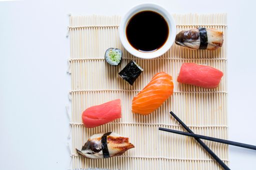A top view of Nigiri sushi set of salmon, tuna and shrimp
