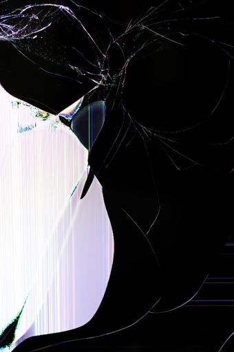 A vertical shot of a broken and non-working screen of an electronic device