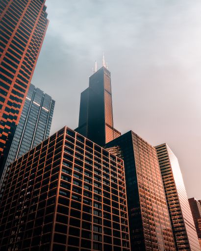 A vertical low angle shot of brown skyscrapers