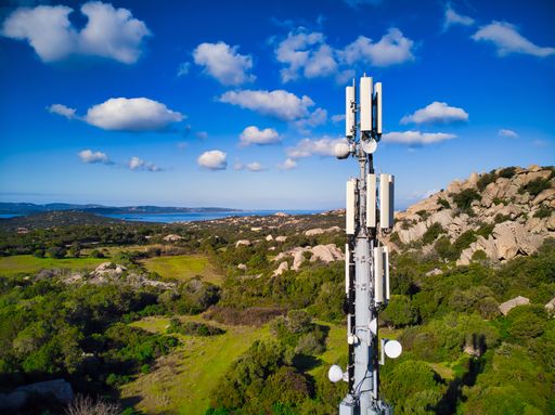 aerial view Cell phone communication antenna  tower with rural countryside landscape
