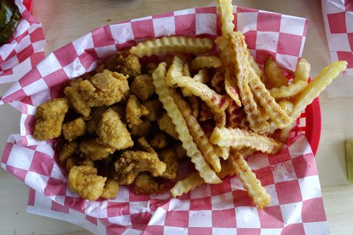 A high angle closeup shot  french fries and boneless