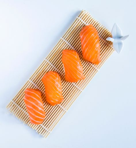 A top view of Japanese food Nigiri sushi set on a white background