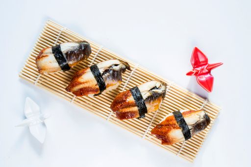 A top view of Japanese food Nigiri sushi set on a white background