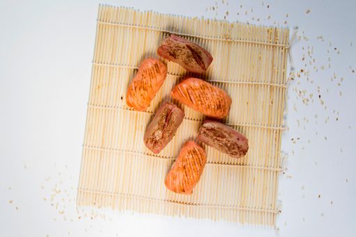 A top view of Japanese food Nigiri sushi set on a white background