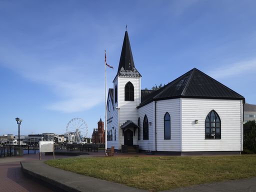 A view of the Norwegian Church Arts Centre and against a blue sky on a sunny day, Cardiff Bay, Wales, United Kingdom