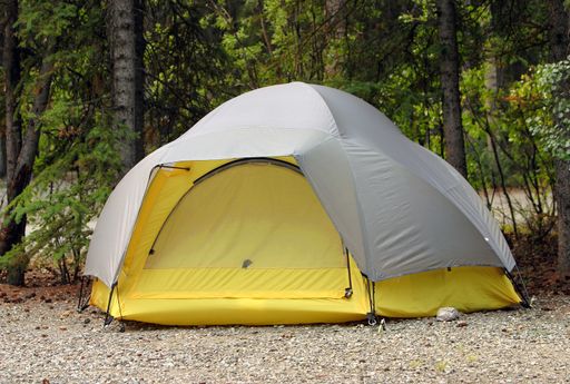 A beautiful view of a yellow Tent camping in Alaska outdoors