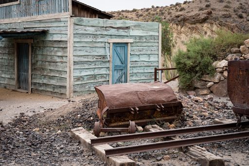 A rusty wagon in the old abandoned gold mine in the old west