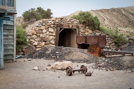 A rusty wagon in the old abandoned gold mine in the old west