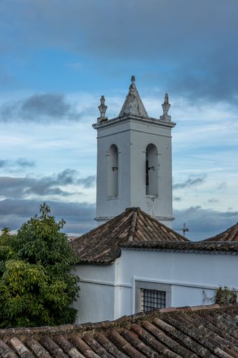 A vertical shot of the Church of Santa Maria do Castelo (Tavira).