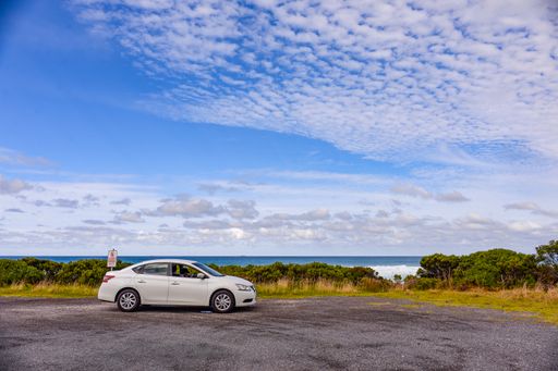 A white car on the Ocean Road Roadside Melbourne Australia