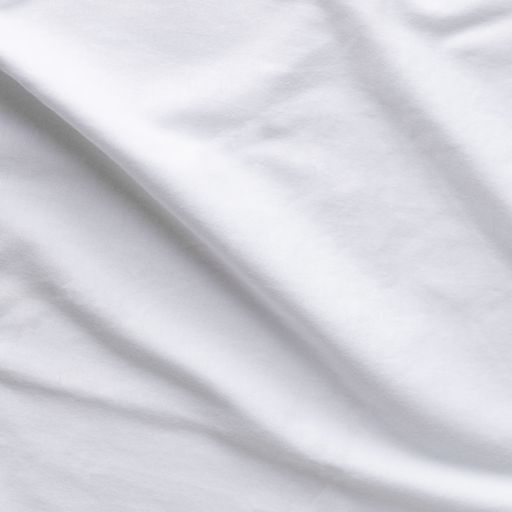 White fabric waves background texture - close up of a textile background