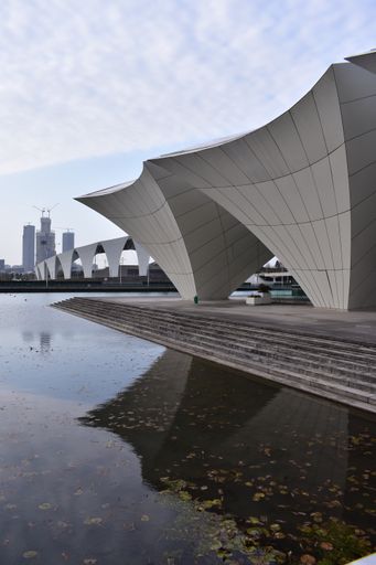 The exterior view of an oriental sports center in Shanghai city, China on a cloudy day