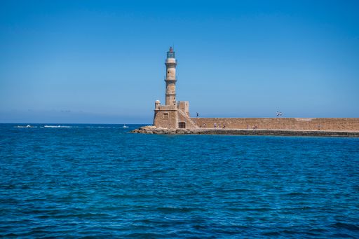A view of the lighthouse of Chania against a blue sky on a sunny day, Crete island, Greece