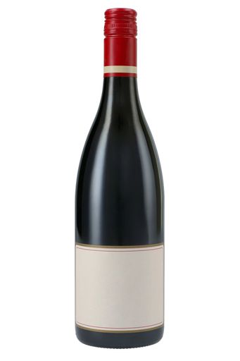 A vertical shot of a champagne bottle with copy space on it on an isolated white background