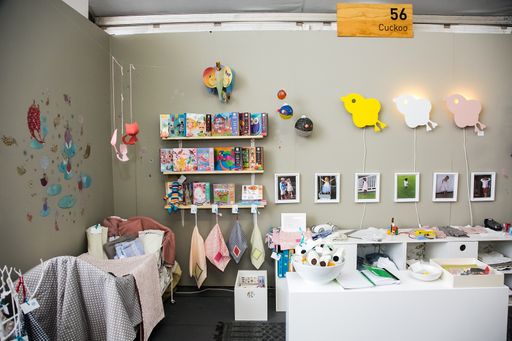 A closeup shot of items on display at exhibitor stands at the hand-made design fair