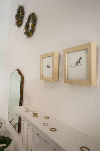 A vertical shot of items on display at exhibitor stands at the hand-made design fair
