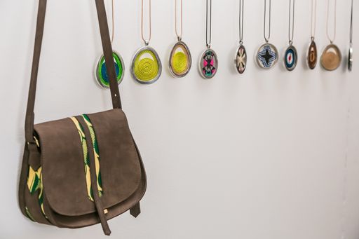 A vertical shot of  on display at exhibitor stands at the hand-made design fair