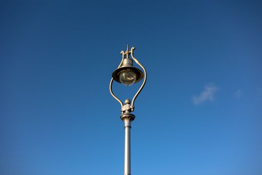 A shot of a lamppost in the daytime.