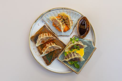 An appetizing fried dumplings Gyoza with soy sauce