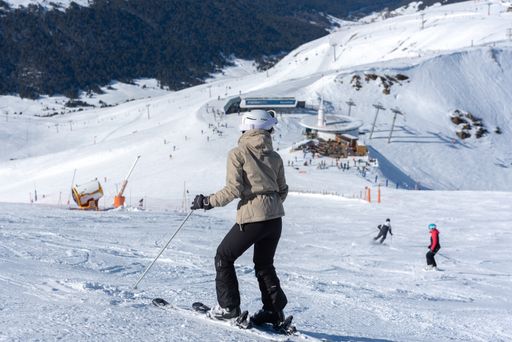 A young person skiing in the Pyrenees at the Grandvalira ski resort, Andorra